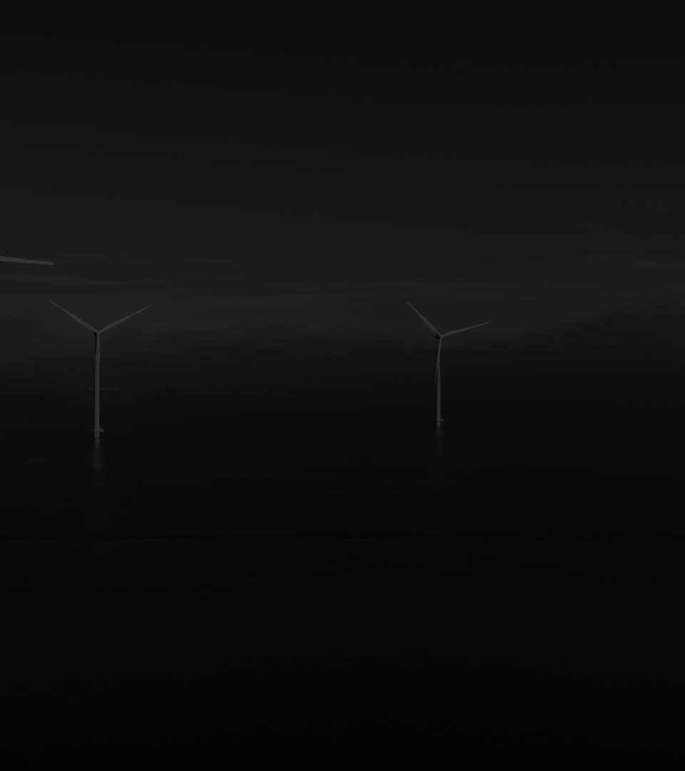 offshore windmill park with clouds and a blue sky, windmill park in the ocean drone aerial view with wind turbine Flevoland Netherlands Ijsselmeer